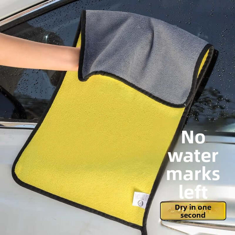 Car wash towel being held, showcasing its dual-sided microfiber design for quick drying.