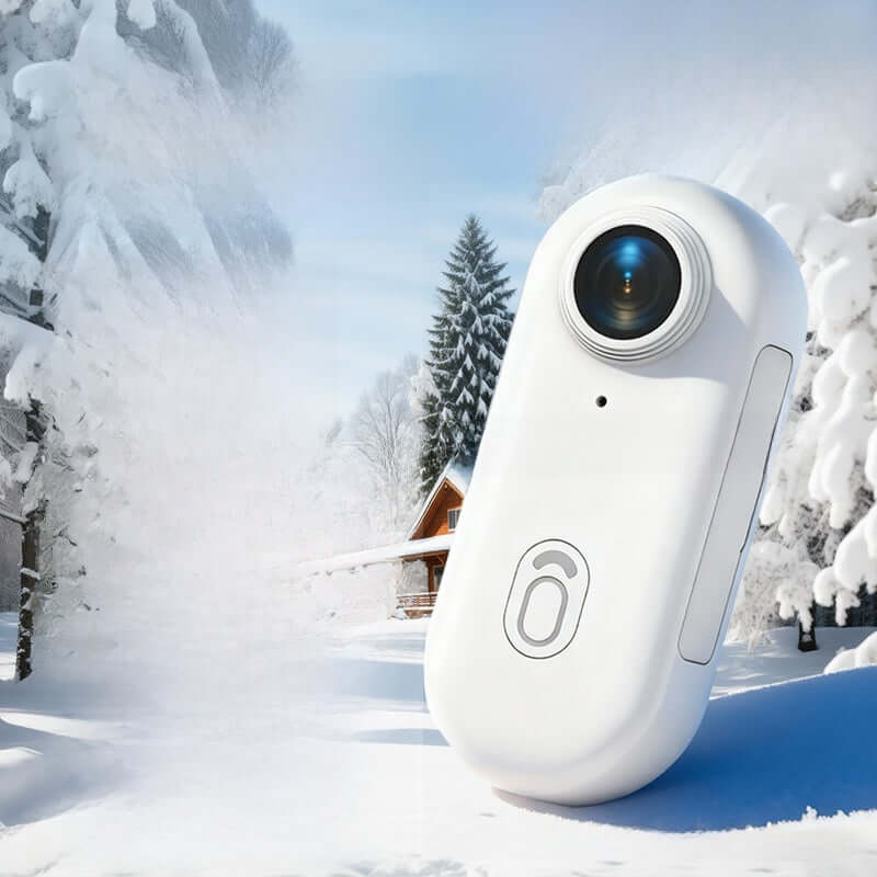 4K Thumb Camera – Ultra Compact on a snowy landscape capturing high-quality images.