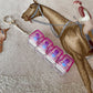 Clickie Keychain featuring pink container design for key organization and style.