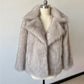 Fluffy Fox Fur Coat Women Loose Elegant Winter displayed on a mannequin, showcasing its luxurious and soft design.