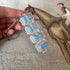 Clickie Keychain with transparent design and blue accents, ideal for organizing keys stylishly.