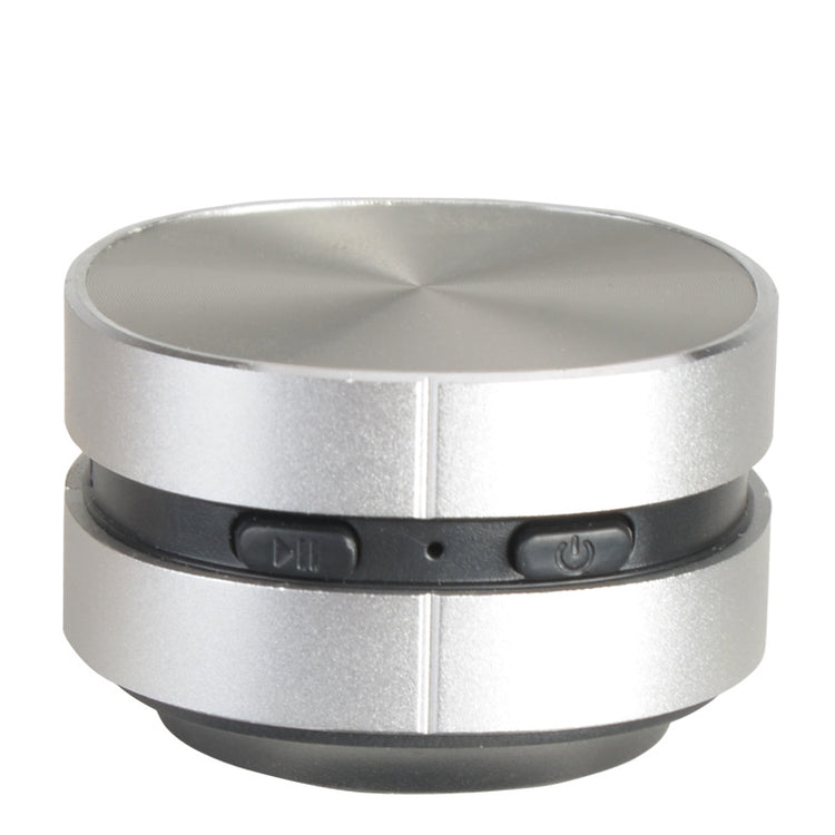 Mini Speaker in silver color with control buttons, showcasing portability and high-quality audio.