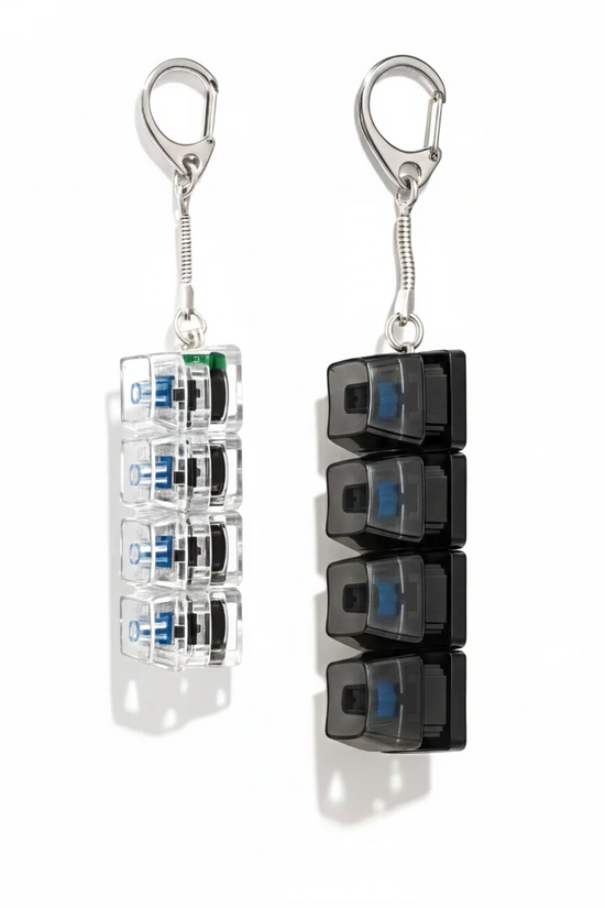 Clickie Keychain showcasing two color options, a transparent and a black version, ideal for organizing keys.