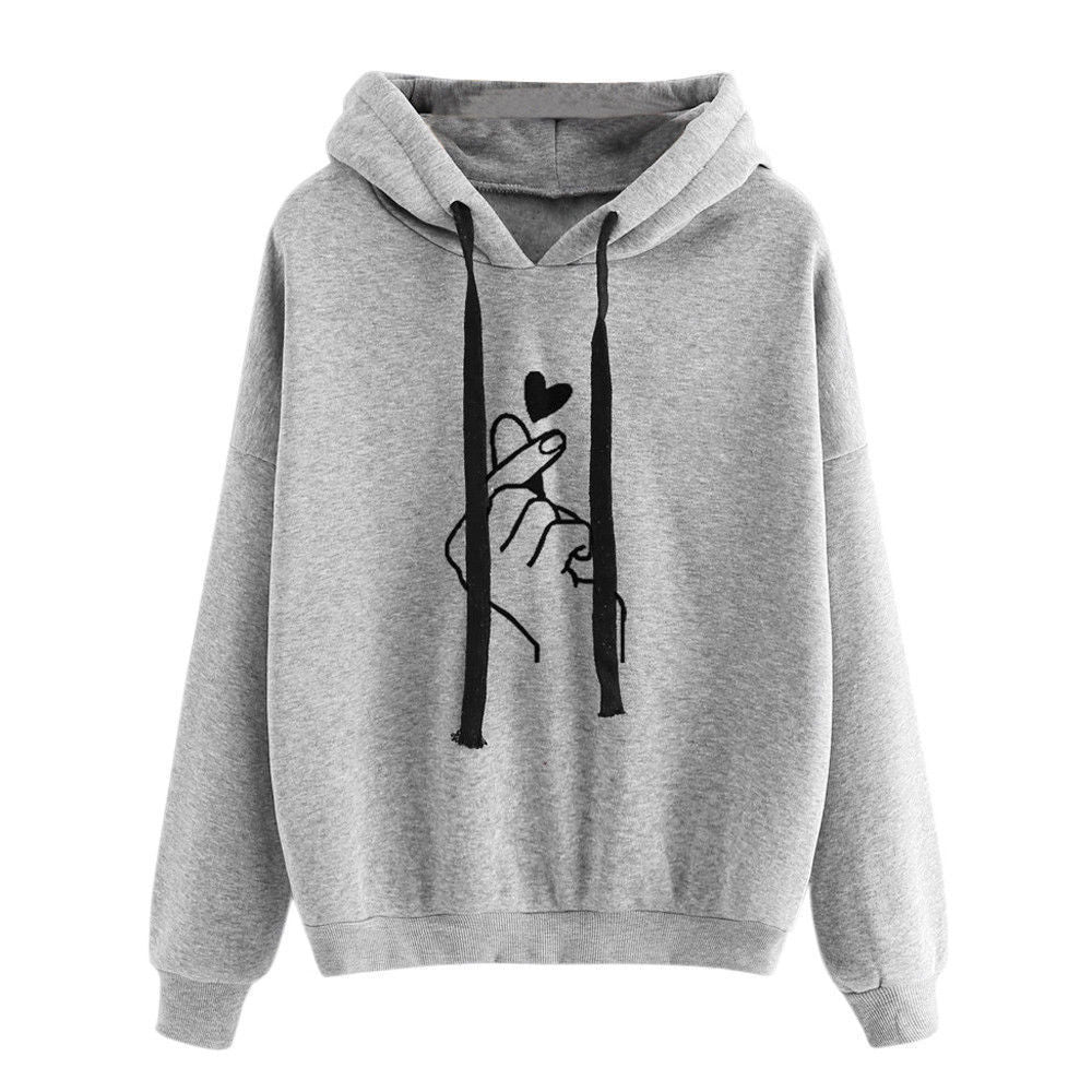 Fleece Hoodie with heart print design and soft fleece lining for warmth and style.