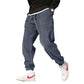 Mens Casual Pants in textured design, paired with stylish athletic shoes, showcasing comfort and modern streetwear fashion.