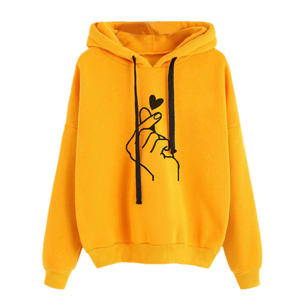 Fleece Hoodie featuring a stylish heart design on a vibrant yellow background.