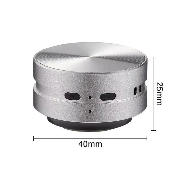 Mini Speaker in silver color showcasing a compact design, measuring 40mm in diameter and 25mm in height.