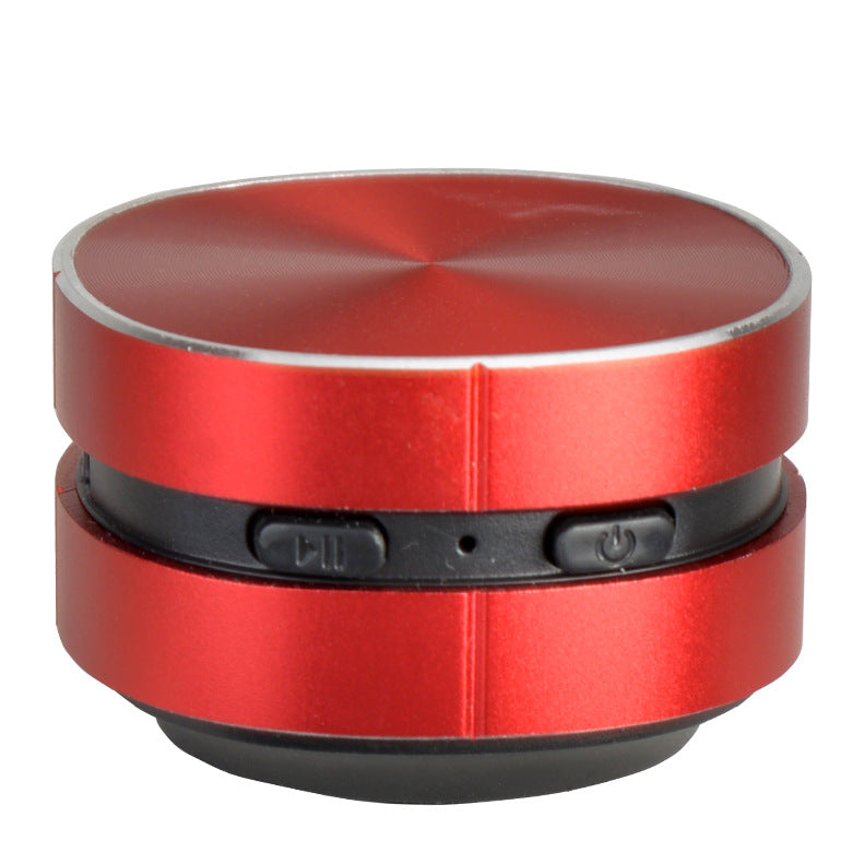 Mini Speaker in red color with controls, showcasing compact design and portability for high-quality audio.