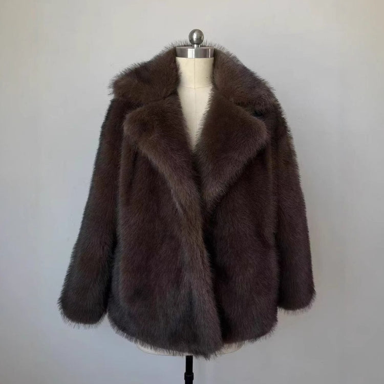 Fluffy Fox Fur Coat Women Loose Elegant Winter displayed on a mannequin, showcasing its luxurious design in a soft brown hue.