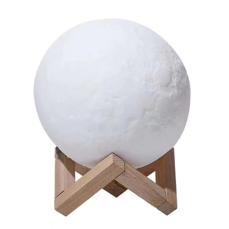 Rechargeable Moon Night Light with Touch Control on a wooden stand, illuminating softly.